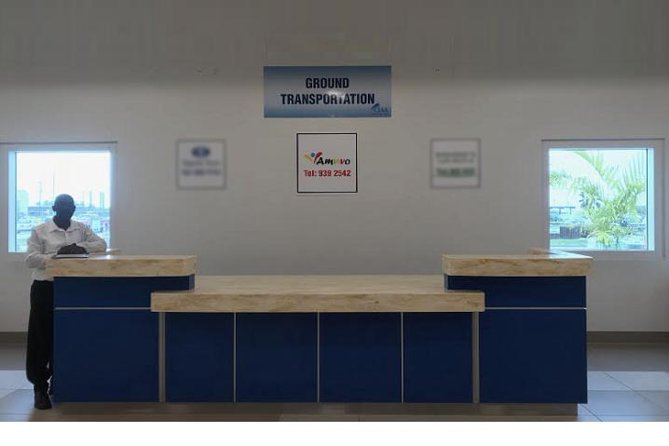 Grand Cayman Shared Airport Transfer - Landing at Owen Roberts International Airport