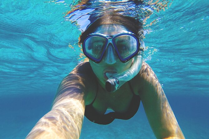 Grand Cayman Stingray City and Reef Snorkeling Combo Tour - Booking, weather, and small details