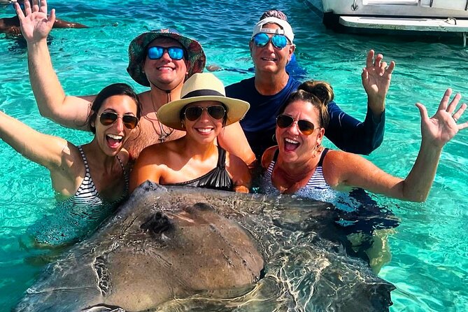 Private Charter 34ft Express Cruiser Stingay City Reef Snorkeling - Stingray City: the main event in waist-deep water