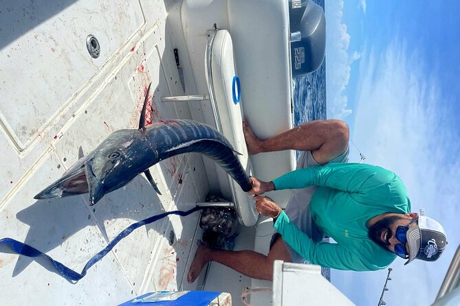 Private Deep Sea Fishing Experience in Grand Cayman - Captain Dylan and the working crew