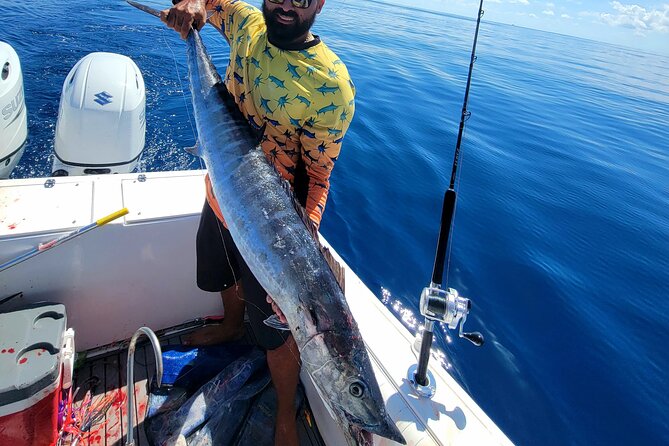 Private Deep Sea Fishing Experience in Grand Cayman - Timing, weather, and cancellation terms