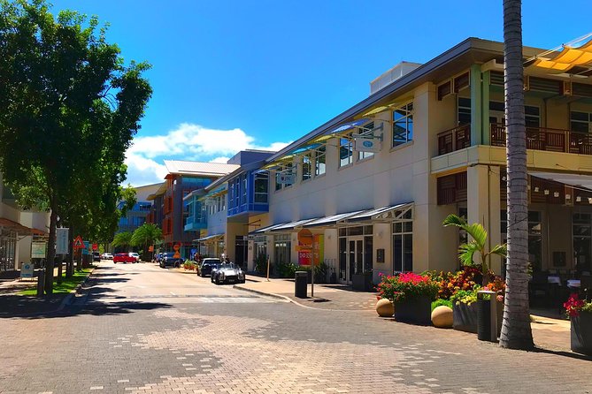 West Bay Sightseeing Tour Plus Seven Mile Beach Visit - Tortuga Rum Factory: sweet samples and a busy stop